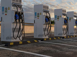 A row of EV stations at dusk