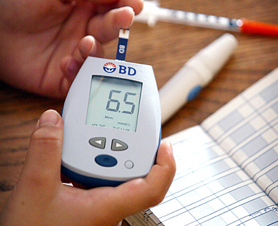 Diabetics young and old can require daily doses of insulin. Blood is often tested with a glucose monitor. 