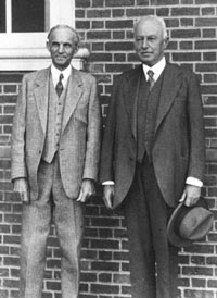 Henry Ford and Giovanni Agnelli stand together during the Fiat founder's third trip to the United States in 1934. Giovanni's grandson Gianni kept a photo of the two men on his desk after he took over Fiat in 1966. (Fiat SpA)