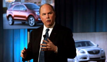General Motors CEO Fritz Henderson speaks to the media in Detroit on Monday. Rebecca Cook/REUTERS