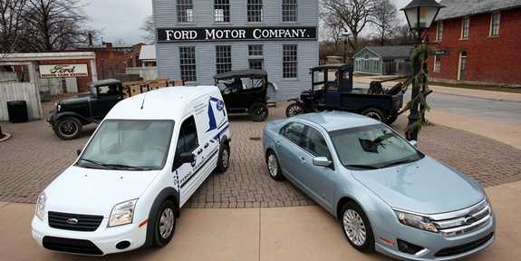 Detroit Free Press Car and Truck of the Year - 2010 Ford Fusion Hybrid (right) and 2010 Ford Transit Connect. The two vehicles were photographed at Greenfield Village in front of Model T trucks and the building that is modeled after Henry Ford's first factory in Detroit. (MARCIN SZCZEPANSKI/Detroit Free Press)