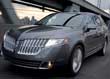 The 2010 Lincoln MKT luxury crossover shares no body panels with the Ford Flex, upon which it is based. The Lincoln is much curvier. (Ford / Lincoln)