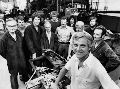 Frank Stronach, front, and employees, 1977.