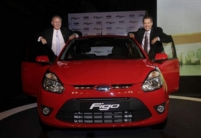 Ford executives Michael Boneham, left, and Joe Hinrichs introduce the new Figo in New Delhi, India, on Tuesday. (Manish Swarup / Associated Press)