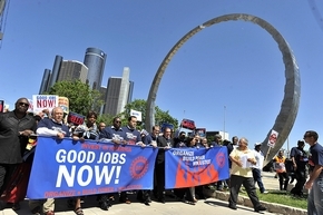 United Auto Workers members march in Detroit on Wednesday after Bob King's election as president. (David Coates / The Detroit News)