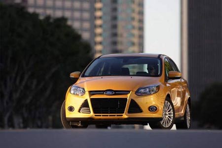 The all-new 2012 Ford Focus. A version gets 40 m.p.g. on the highway, and the announcement comes as gas prices have surged across the country. / Ford