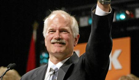 Federal NDP Leader Jack Layton waves to the crowd after Layton's victory in the federal election in Toronto on Monday, June 28, 2004.