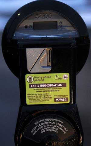Motorists can pay for parking with smartphones in meters off West Village Drive in Dearborn. (Elizabeth Conley / The Detroit News)