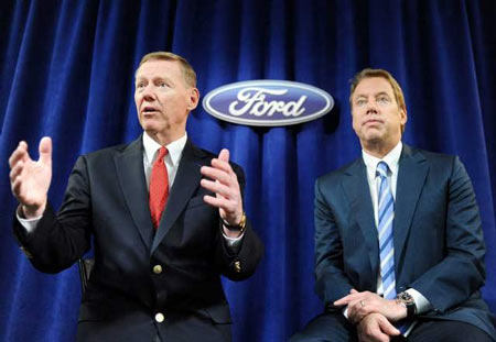 Ford President and CEO Alan Mulally, left, and Executive Chairman Bill Ford address the media during a news conference after Ford's meeting of shareholders Thursday in Wilmington, Del. Mulally said Ford expects global sales of 8 million vehicles by 2015 from 5.3 million in 2010. / William Thomas Cain/Getty Images