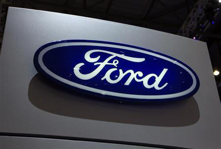 A Ford logo is seen on the car maker's booth during the first media day of the Geneva Auto Show at the Palexpo in Geneva, March 6, 2012