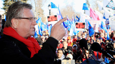 Ken Lewenza, CAW National President, speaks at a rally dubbed a 'London Day of Action Against Corportate Greed,' in London, Ont., on January 21, 2012. (Dave Chidley / THE CANADIAN PRESS)
