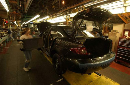 A Mazda6 winds its way down the line in Flat Rock. The automaker will move production of the Mazda6 to Japan. (The Detroit News)