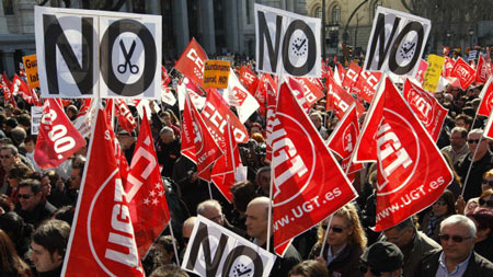 People protest against the labour reform of the Spanish government in central Madrid February 19, 2012.