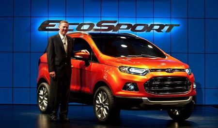 President and CEO, Ford Motor Company Alan Mullaly previews the new Ford EcoSport car in New Delhi on January 4. (MANAN VATSYAYANA/AFP/Getty Images)