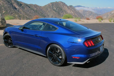 The 2015 Mustang is the most aerodynamic ever. Note the signature rear three-element taillights now with full LCDs.