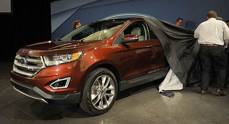 Ford takes the wraps off of the 2015 Edge Crossover at a press conference at the Ford Product Development Center in Dearborn, June 24, 2014. (Charles V. Tines / The Detroit News)