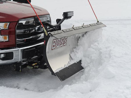 The 2015 Ford F-150 equipped with the Boss Snow Plow made easy work of a snow-covered parking lot