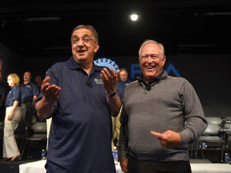 Fiat Chrysler Chairman and CEO Sergio Marchionne, left, and UAW President Dennis Williams - Photo Max Ortiz
