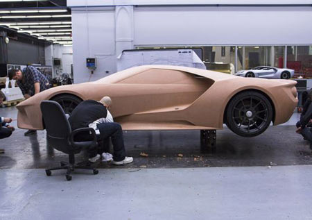 Designers work on clay models of Ford's GT Supercar. Ford engineers and designers spent 14 months crafting the 2017 GT Supercar inside a secretive basement room of Ford's Dearborn Product Development Center. (Photo: Ford Motor Company)