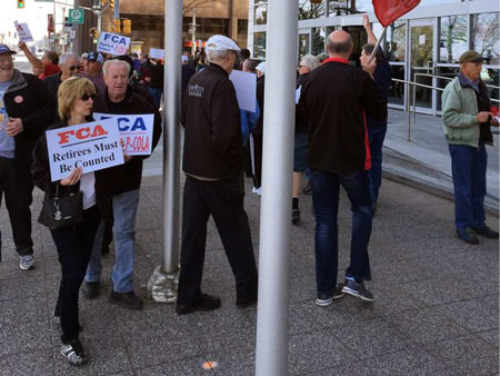 Unifor retirees protest in front of FCA Canada headquarters on Riverside Drive. Handout / Windsor Star