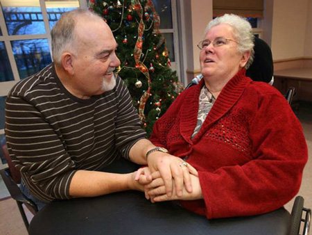Dec. 8, 2009. Rick Reaume spends time with his wife Sylvia, who has Alzheimer's and has been placed at the Malden Park Continuing Care Centre because she can no longer walk or see. The CAW Local 444 is making a big donation to the Alzheimer's Society on the Reaumes' behalf. (DAN JANISSE/The Windsor Star