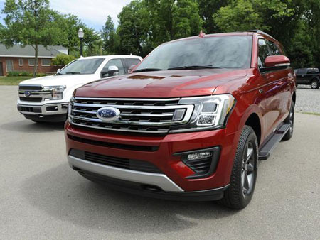 The 2018 Ford Expedition XLT, right, and F-150 King Ranch series are on display for the media at Ford Field Park in Dearborn, Mich. on Thursday, June 15, 2017 (Photo: Jose Juarez / Special to Detroit News)
