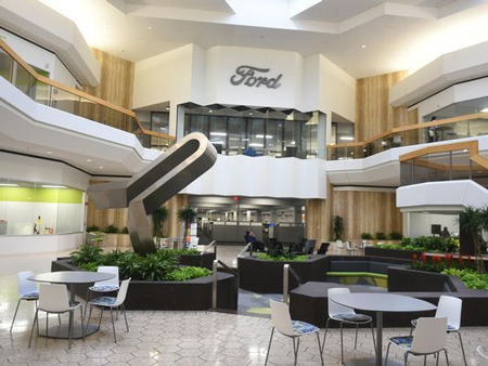 The grand atrium at Ford Motor Co.’s office space for engineers and development employees encourages socializing inside a wing at Fairlane Town Center in Dearborn.