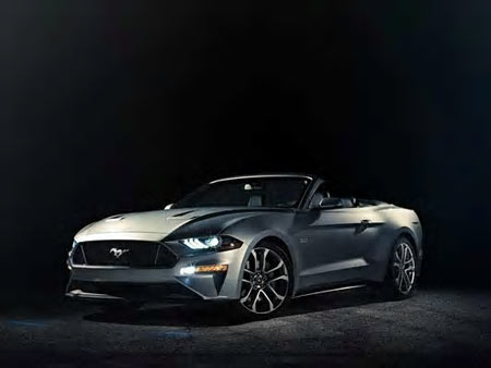 Ford on Friday released photos the first images of its refreshed 2018 Ford Mustang convertible. The topless pony car features the same styling changes and enhancements as its coupe sibling that debuted earlier this week at the Detroit auto show.