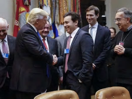 President Donald Trump greets Ford Motor Company CEO Mark Fields, with Fiat Chrysler Automobiles Sergio Marchionne, right, and White House senior adviser Jared Kushner during a meeting with auto industry leaders in the Roosevelt Room of the White House on Jan. 24, 2017