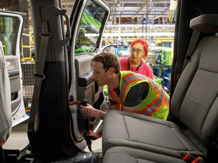 Facebook CEO and founder Mark Zuckerberg helps on the Ford assembly line where an F-150 is being produced.