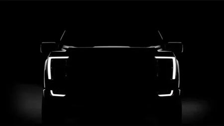 The computer-generated image shows the darkened profile of the new Ford F-150's front end with no features visible except for LEDs framing the grille. (Photo: Ford Motor Co.)