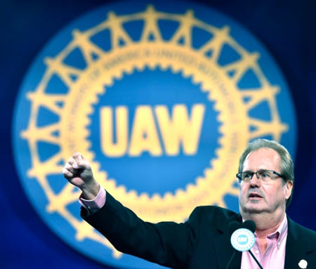 UAW President Gary Jones fires up delegates Wednesday as he starts the chant, 'We Are One,' during his keynote speech. Jones said automakers are "on notice" over the closing of plants and shipping jobs to Mexico. (Photo: Todd McInturf, The Detroit News)