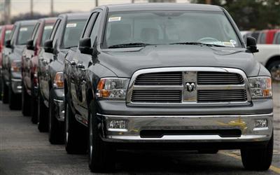 Dodge Ram trucks sit parked outside a Chrysler manufacturing plant December 19, 2008 in Fenton, Missouri. Chrysler announced plans to idle North American manufacturing plants until January 19, 2009.