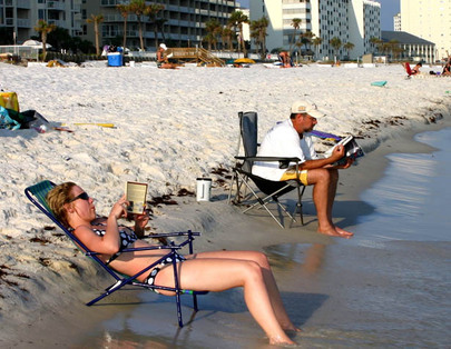 Sunseekers relax on a beach in Destin, Fla. The Sunshine State offers of housing options to fit a range of incomes.