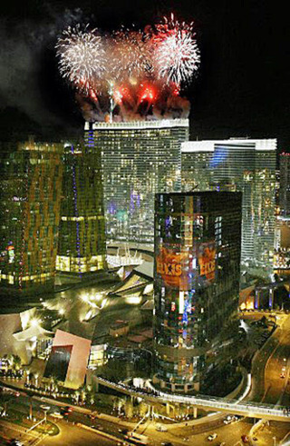 Fireworks shoot off the Aria Hotel and Casino moments before its opening at CityCenter in Las Vegas on Wednesday Dec 16, 2009